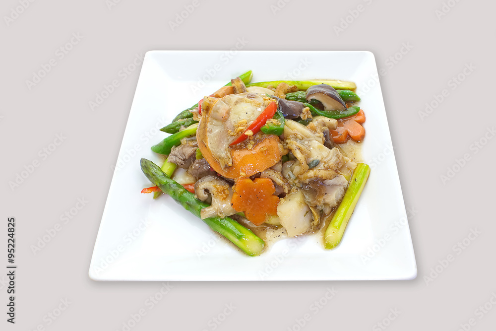 Fried noodle in gravy with seafood and fresh vegetable Fried noodle in gravy with seafood and fresh vegetable