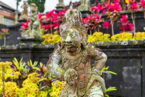 Balinese God statue in temple complex, Bali, Indonesia
