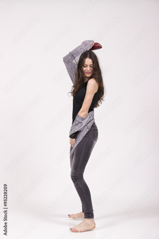 playful girl, dancing in studio freestyle, wild. white backgroun playful girl, dancing in studio freestyle, wild. white backgroun