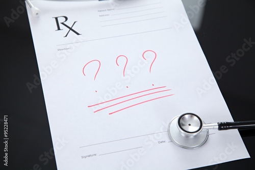 Wallpaper Mural Stethoscope and prescription, black reflective background Torontodigital.ca