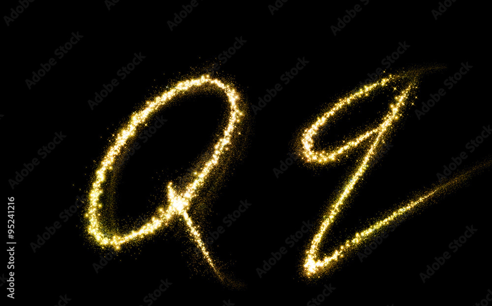 Q letter of gold glittering stars dust flourish tail Q letter of gold glittering stars dust flourish tail