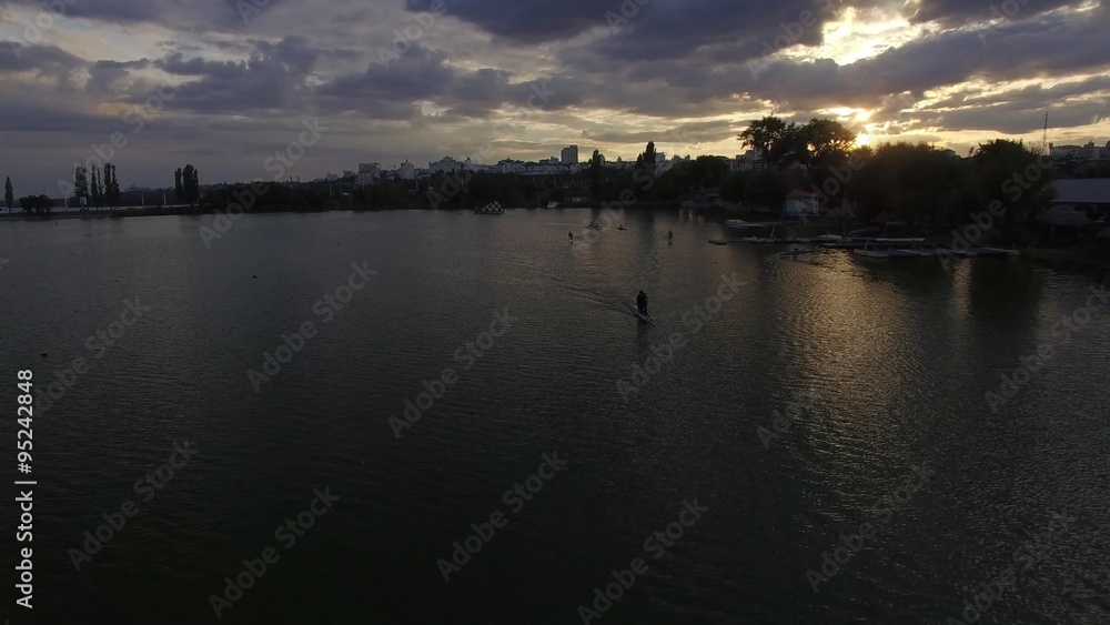 A man swims on a kayak. Voronezh city. A man swims on a kayak. Voronezh city.