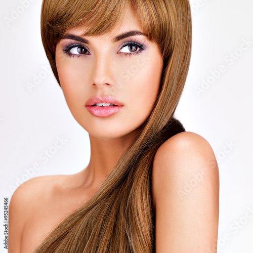 Beautiful indian woman with long straight brown hair