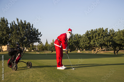 Santa Claus on a golf course