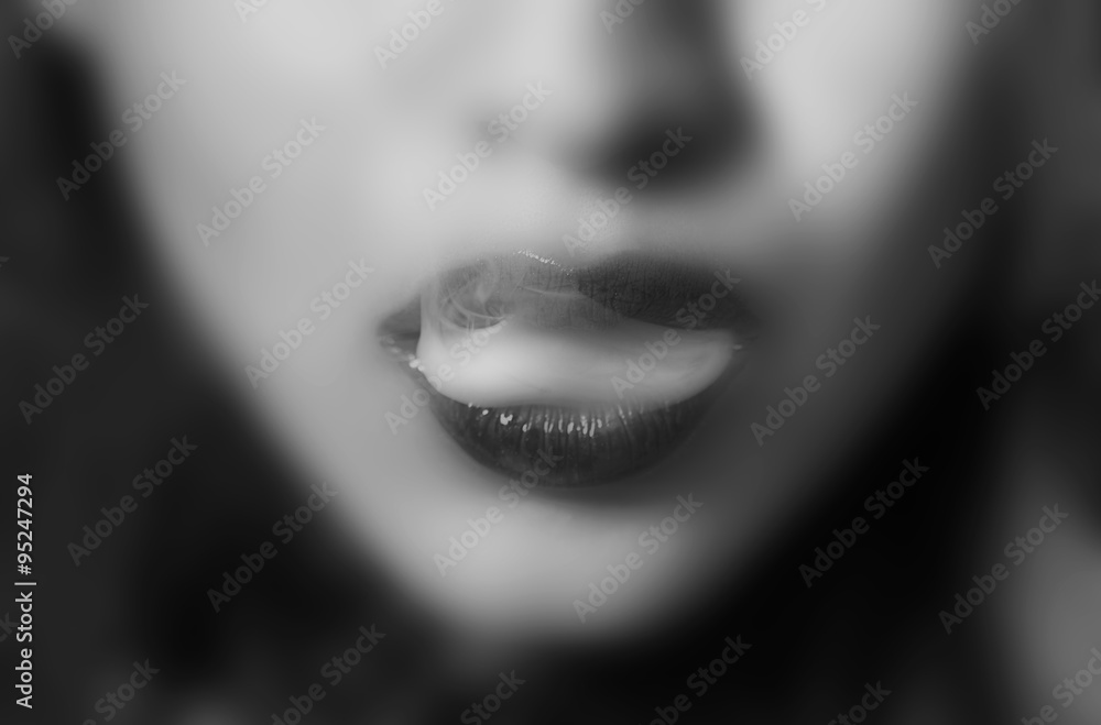Fototapeta premium Sensual woman blurred closeup portrait black and white