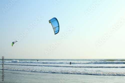 Kiteboarder enjoy surfing in the sea
