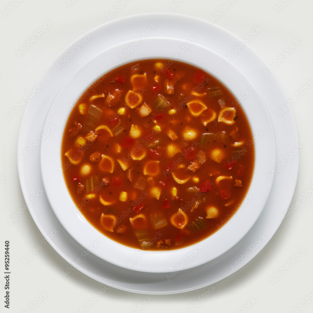 Bowl of homemade minestrone soup made with fresh wholesome ingredients Bowl of homemade minestrone soup made with fresh wholesome ingredients