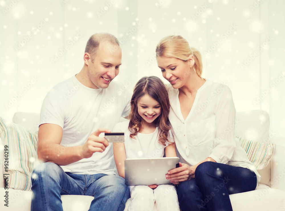 happy family with tablet pc and credit card