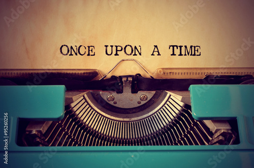 retro typewriter and text once upon a time