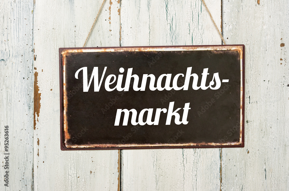 Altes Blechschild vor weißer Holzwand - Weihnachtsmarkt Altes Blechschild vor weißer Holzwand - Weihnachtsmarkt