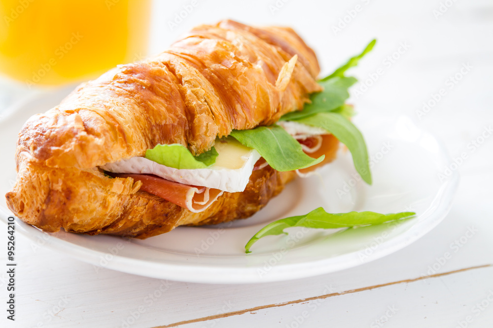 Sandwich croissant with ham brie arugula Sandwich croissant with ham brie arugula