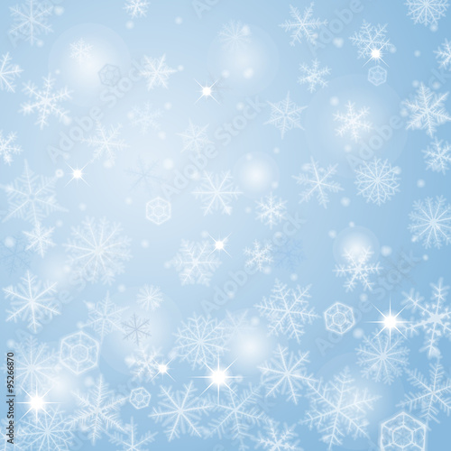 Abstract light blue christmas background with snowflakes.