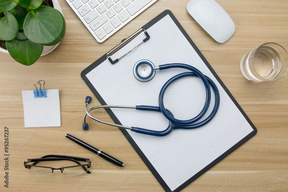 Stethoscope in doctors desk Stethoscope in doctors desk