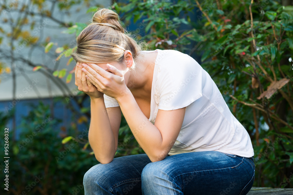 Woman Covering Face With Hands Woman Covering Face With Hands