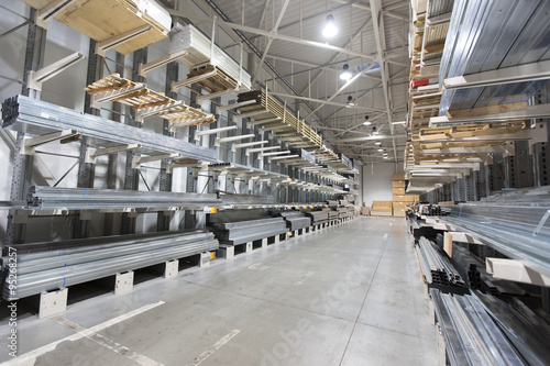 construction material warehouse, shelves with aluminum profiles