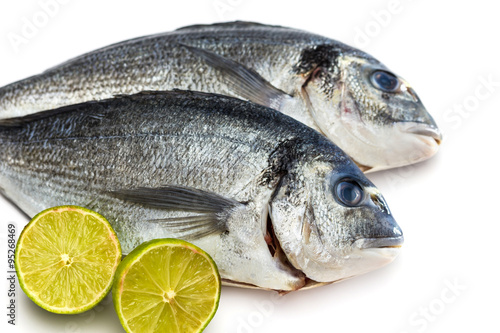 Bream fish with lime isolated on white background