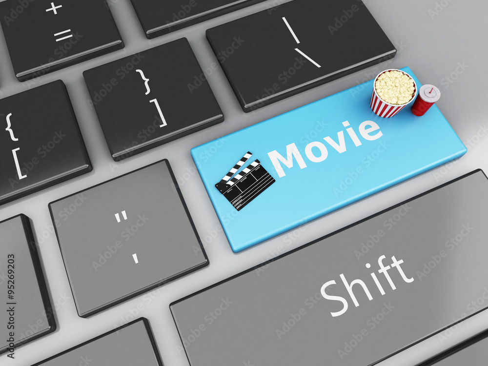 Naklejka premium 3d Clapper board with popcorn on computer keyboard.