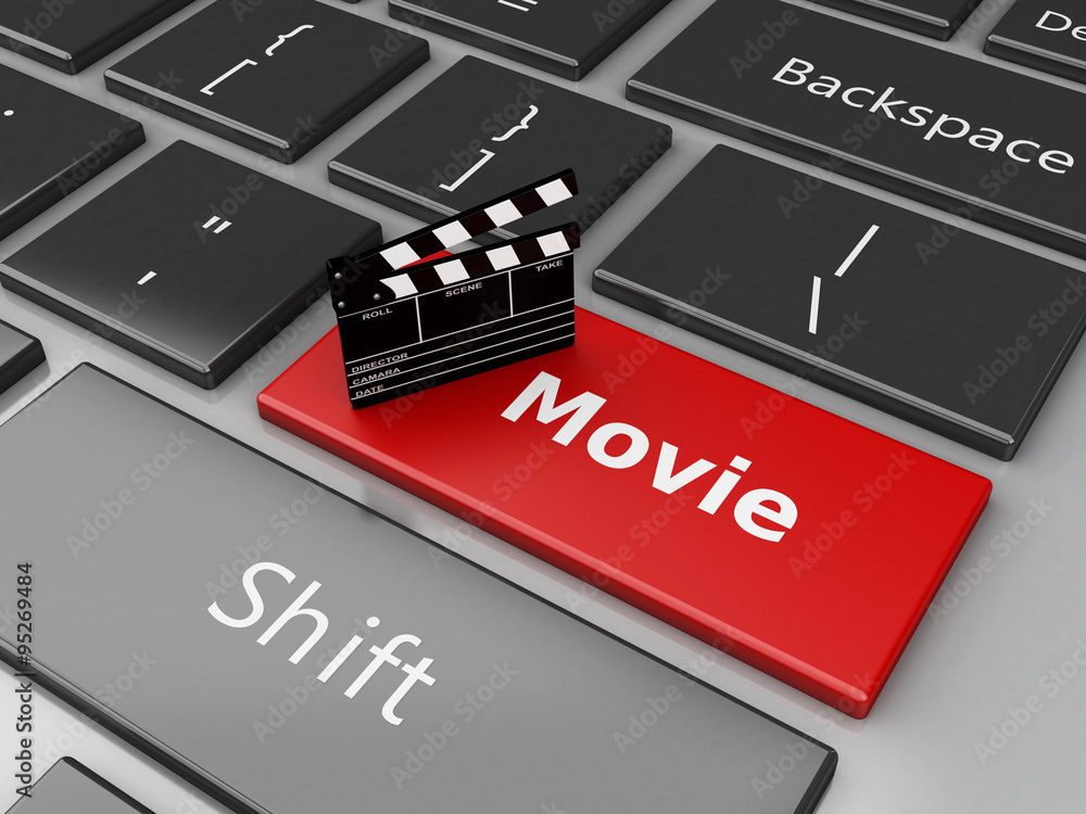Naklejka premium 3d Cinema clapper board on computer keyboard.