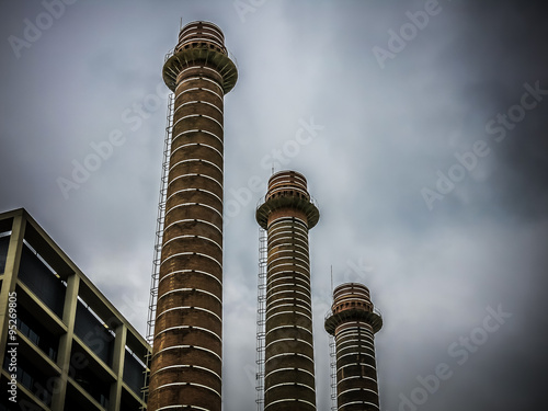 Canvas Print Three chimneys of former electrical plant Canadenca