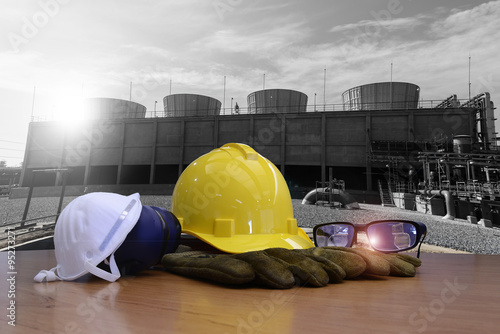 Outdoor work Workers in oil refineries. Safety helmets must be worn for safety.