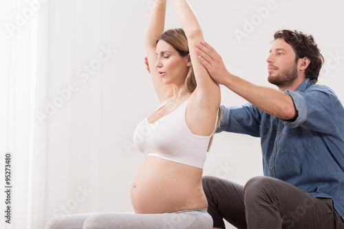 Pregnant woman in birthing school