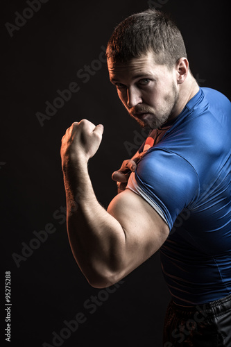 Man showing biceps © Volodymyr