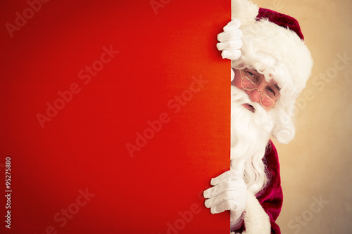 Santa Claus holding banner photo