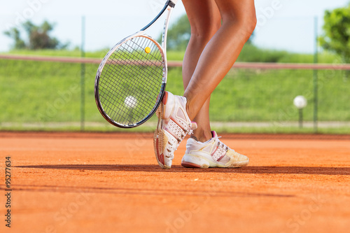 Legs of female tennis player.Close up image. © BalanceFormCreative