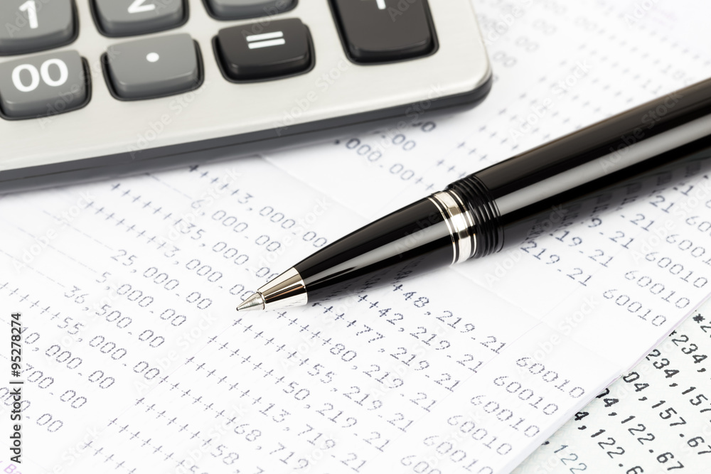 Bank account passbook with pen and calculator Bank account passbook with pen and calculator