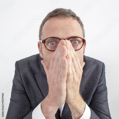 scared manager hiding his emotions for corporate mistake or silence