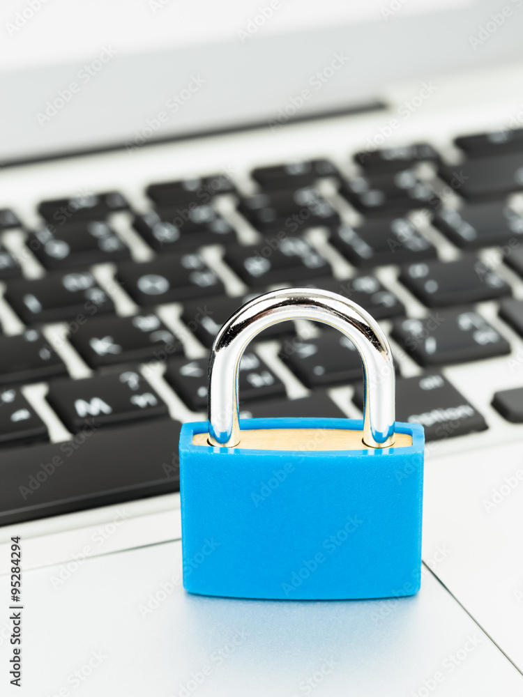 Padlock on keyboard concept computer security Padlock on keyboard concept computer security