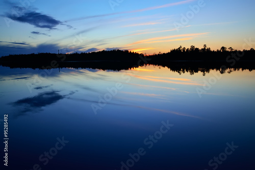 Evening peace on the lake Pongoma. Karelia, Russia