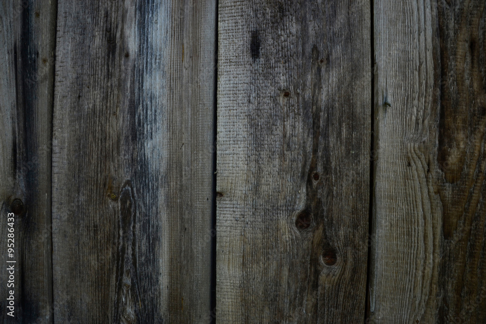 Old wood texture backgound. Wooden wall on aged shed in the rural garden Old wood texture backgound. Wooden wall on aged shed in the rural garden