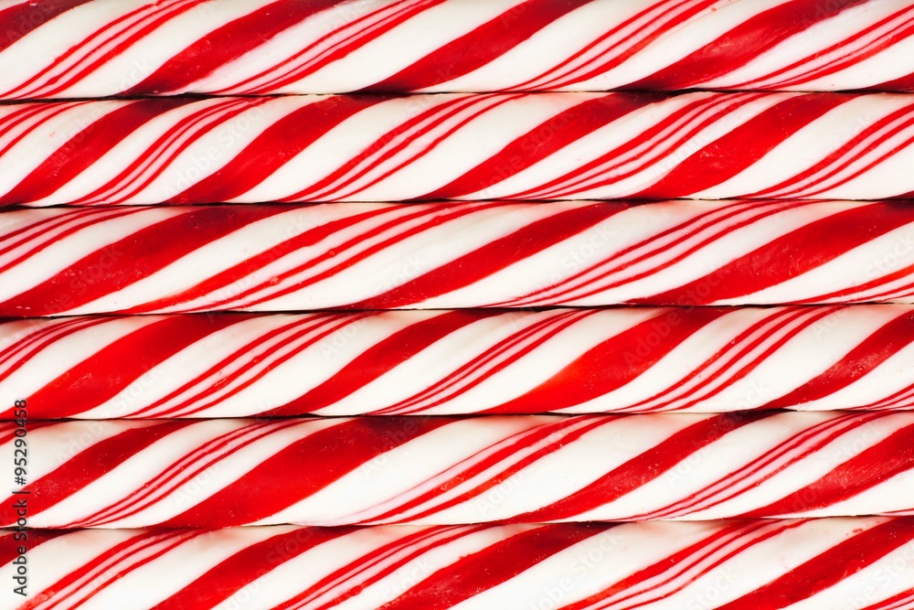 Full background of red and white striped Christmas candy canes