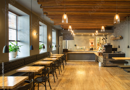 Interior of restaurant. Wooden design.
