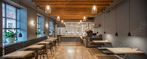 Interior of restaurant. Panorama. Wooden design. photo