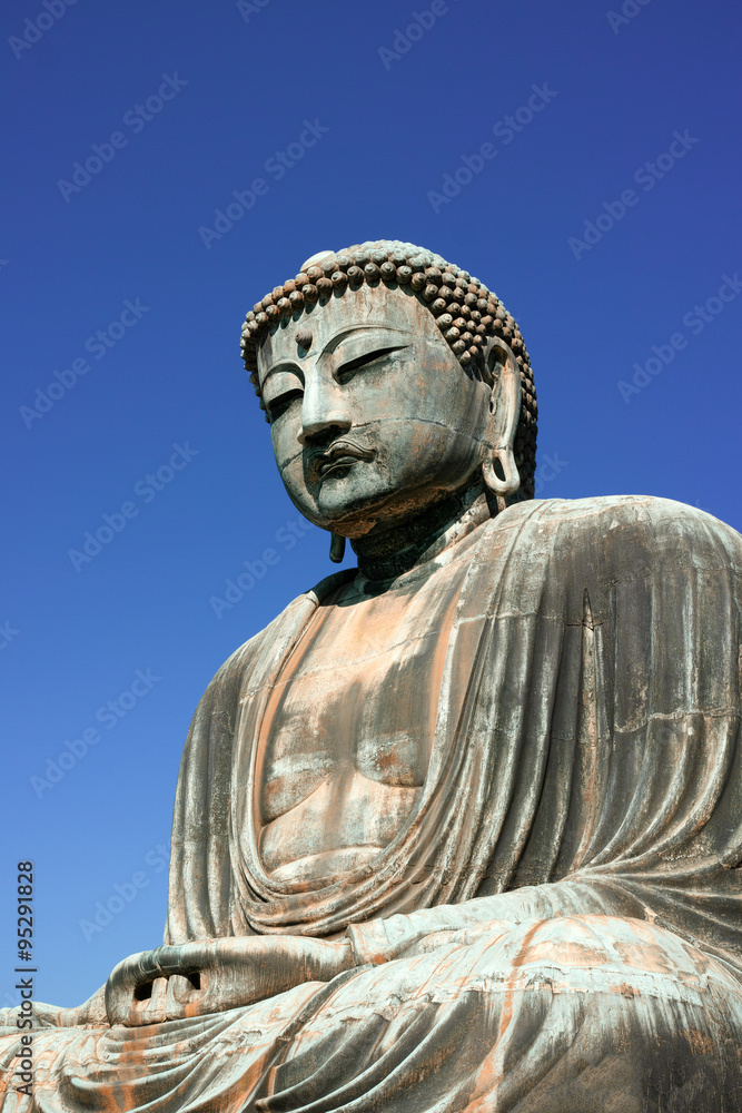 The Great Buddha, Daibatsu in Kamakura Japan on a beautiful clear autumn afternoon. The Great Buddha, Daibatsu in Kamakura Japan on a beautiful clear autumn afternoon.