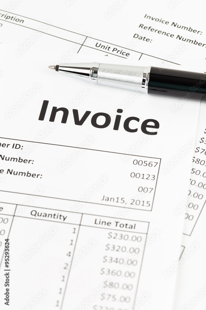 Fototapeta premium Invoice with pen; invoice is mock-up