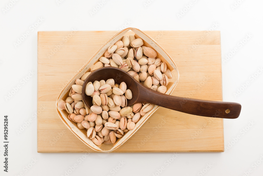kitchen utensils with wooden containers full of nuts kitchen utensils with wooden containers full of nuts