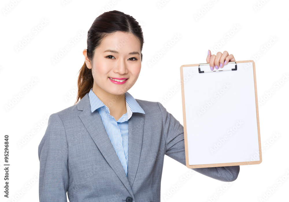 Businesswoman showing clipboard Businesswoman showing clipboard