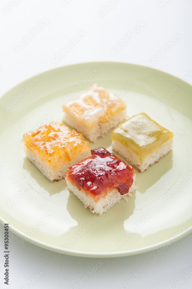 Mix fruit, blueberry, orange fruit jam spread on bread toast ove Mix fruit, blueberry, orange fruit jam spread on bread toast ove