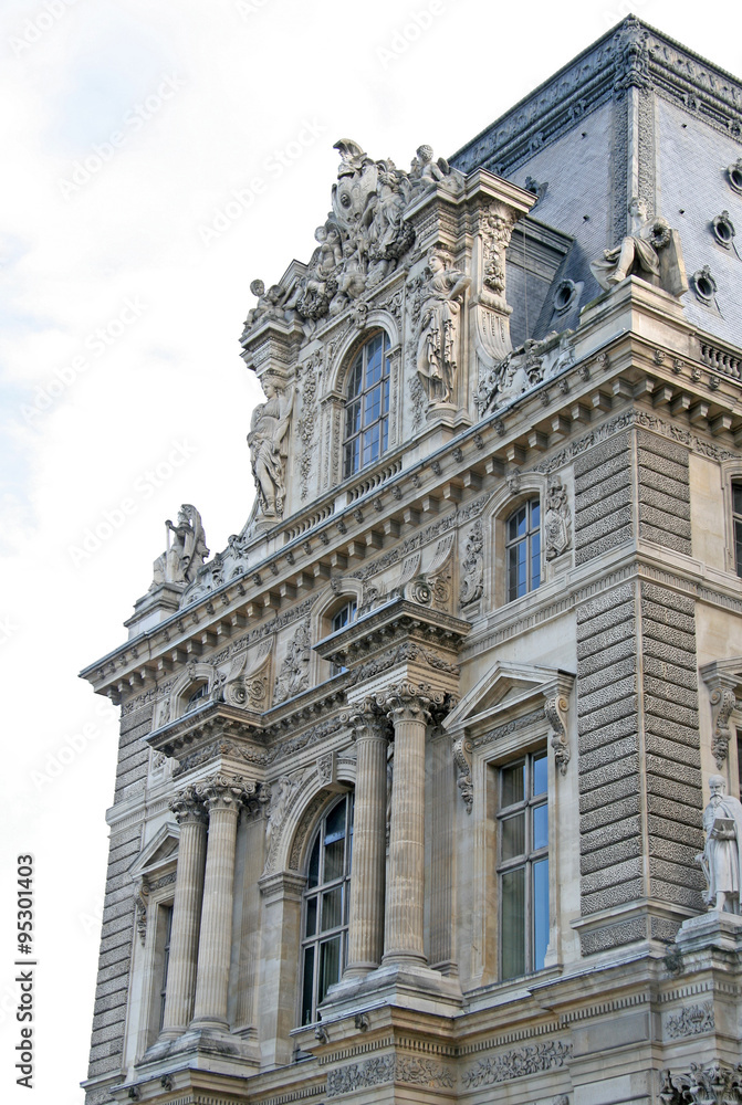 PARIS, FRANCE - NOVEMBER 27, 2009:  Fragment of one of facades of the royal Louvre palace. Now Louvre is one of the largest museums in the world