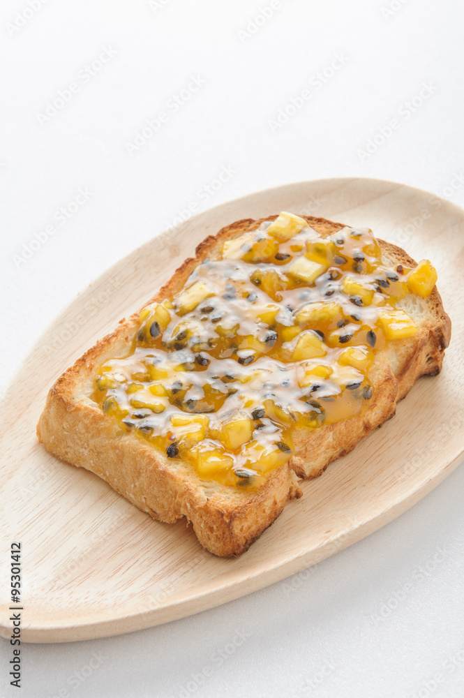 breakfast with toast fruit jam and butter on table breakfast with toast fruit jam and butter on table