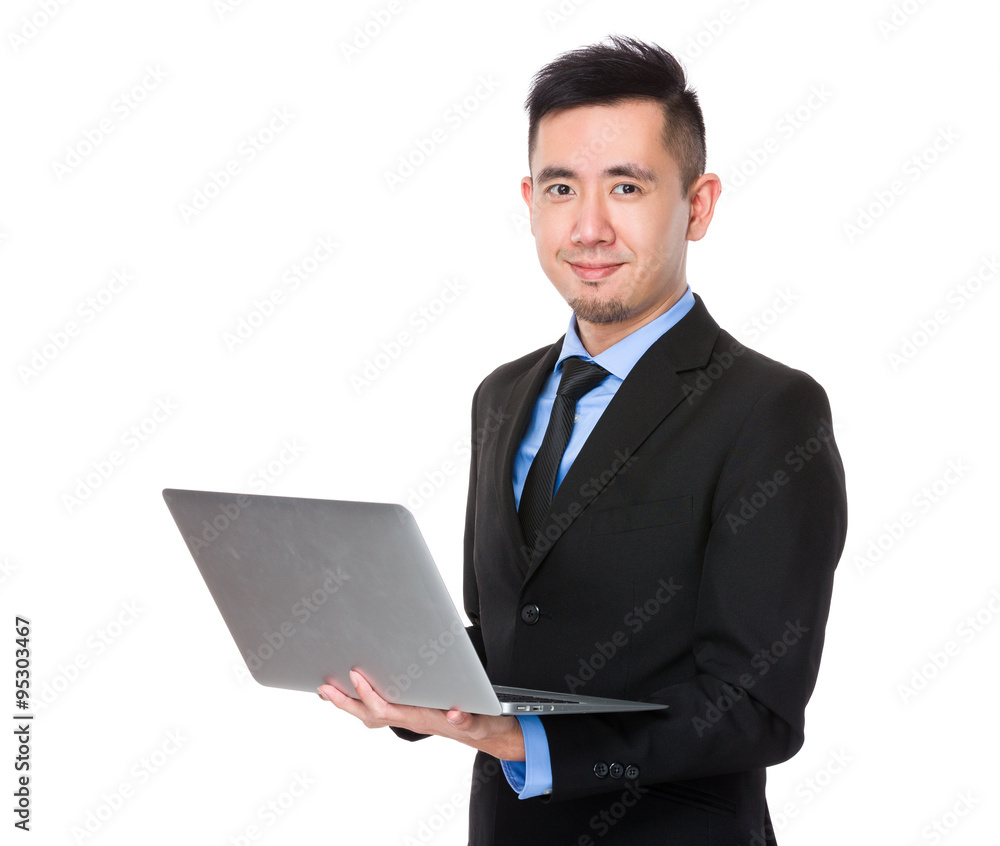Asian Businessman use of the laptop computer Asian Businessman use of the laptop computer