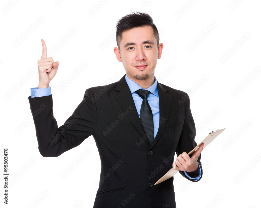Businessman hold with clipboard and finger point up Businessman hold with clipboard and finger point up
