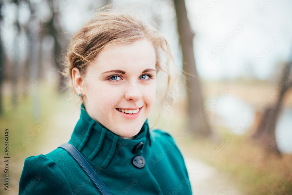Portrait Of Beautiful Plus Size Young Woman In Blue Coat Posing Portrait Of Beautiful Plus Size Young Woman In Blue Coat Posing
