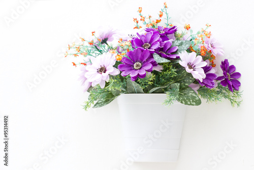 Wallpaper Mural Artificial flowers in the wall. Torontodigital.ca