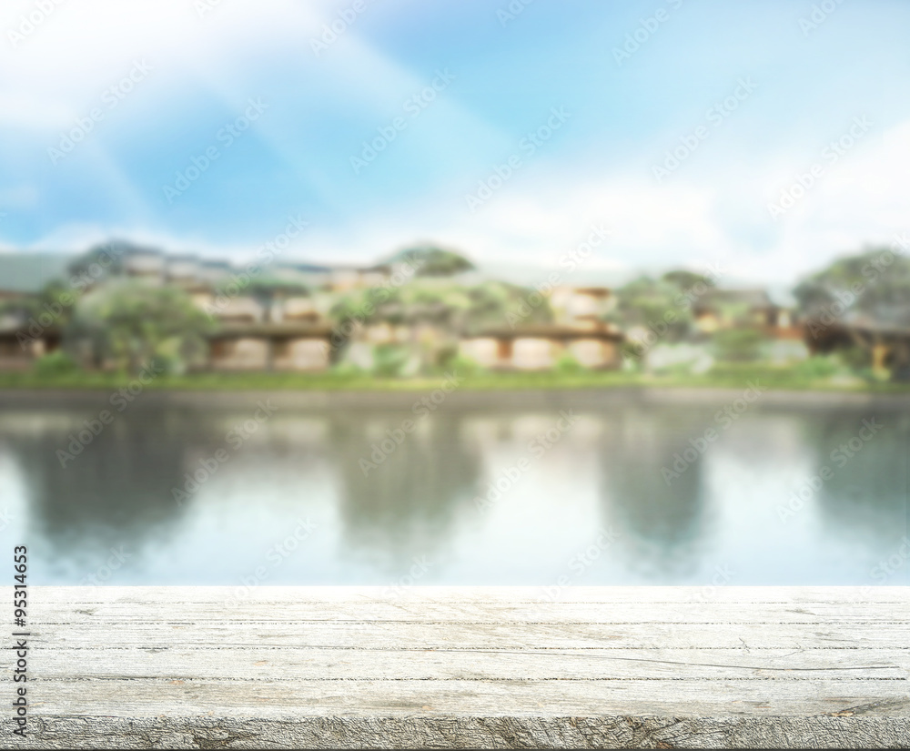Fototapeta premium Table Top And Blur Building Of Background