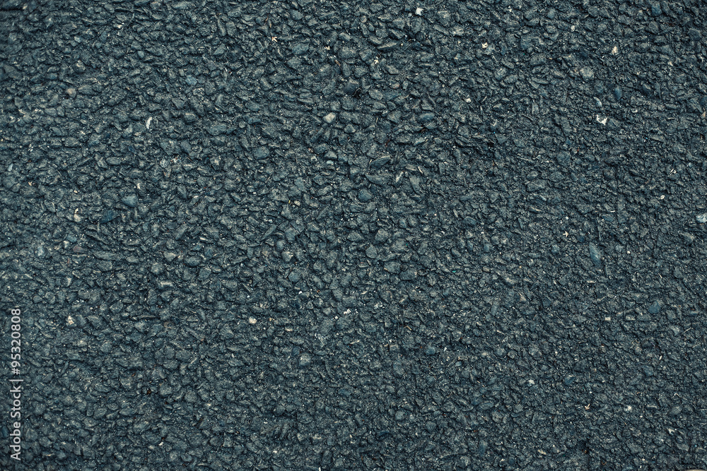 Coarse gray asphalt.