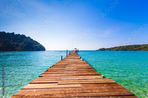 Tourism Concept. Old wooden pier. paradise island